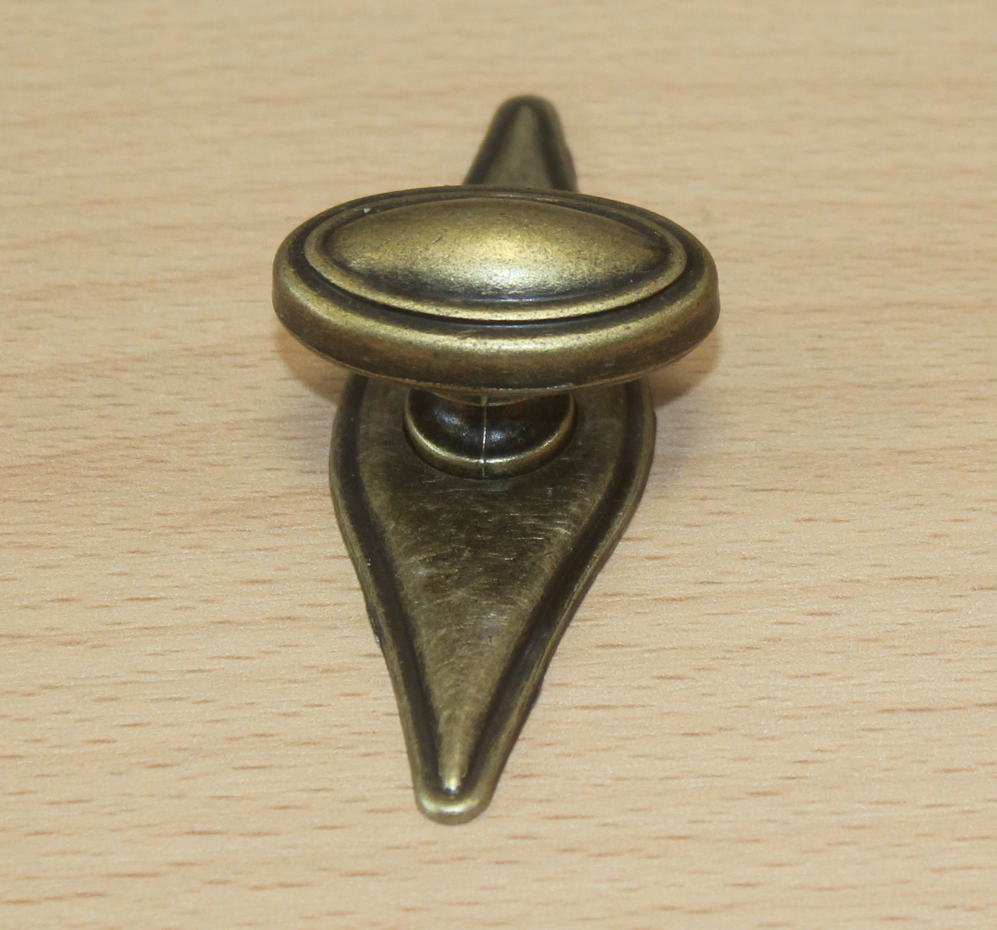 11107-knopka staromosaz 35x19mm