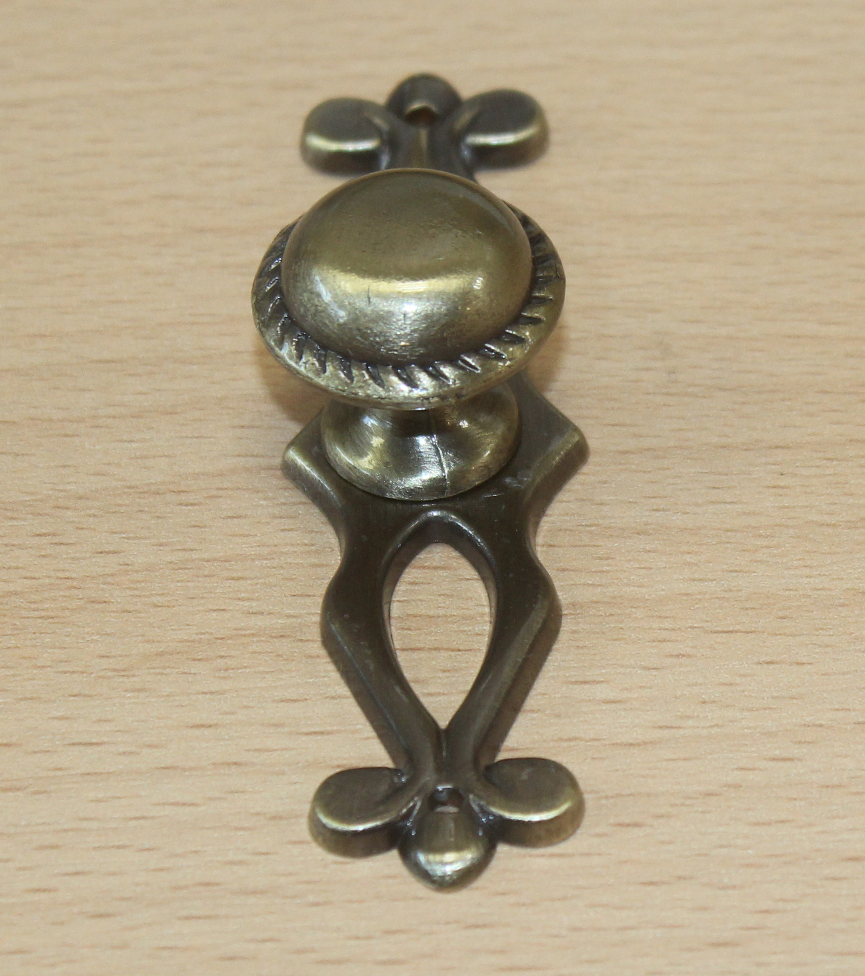 11109-knopka staromosaz pr.24mm s podl.88mm