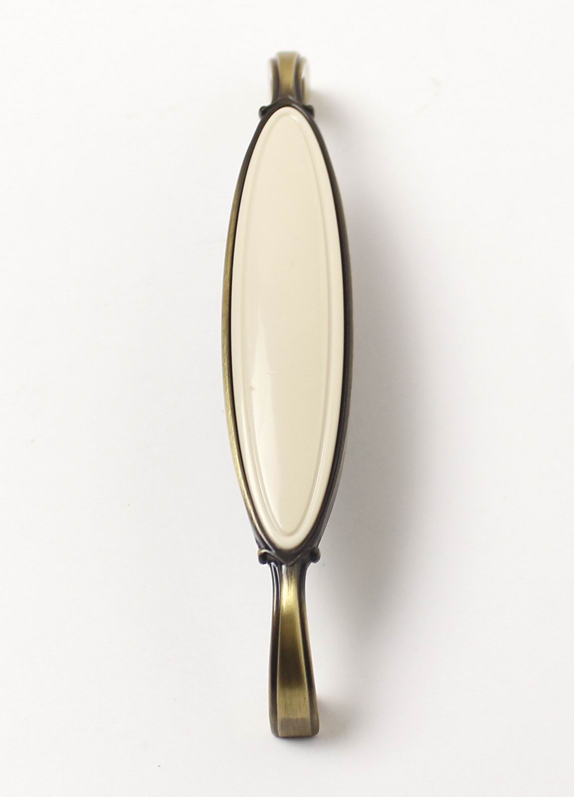 14017 úchytka DITA rozteč 128mm staromosaz