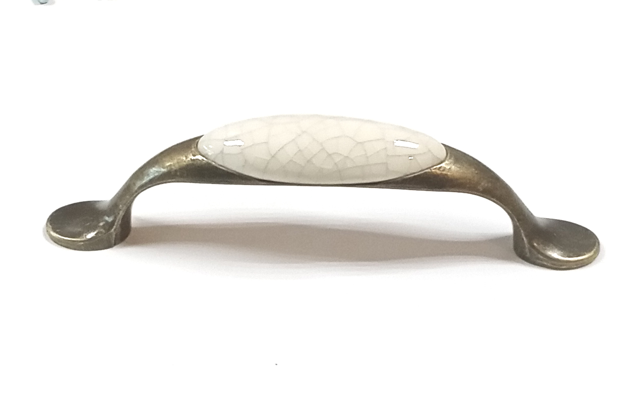 62144-úchytka 96mm staromosaz porcelán popraskaný