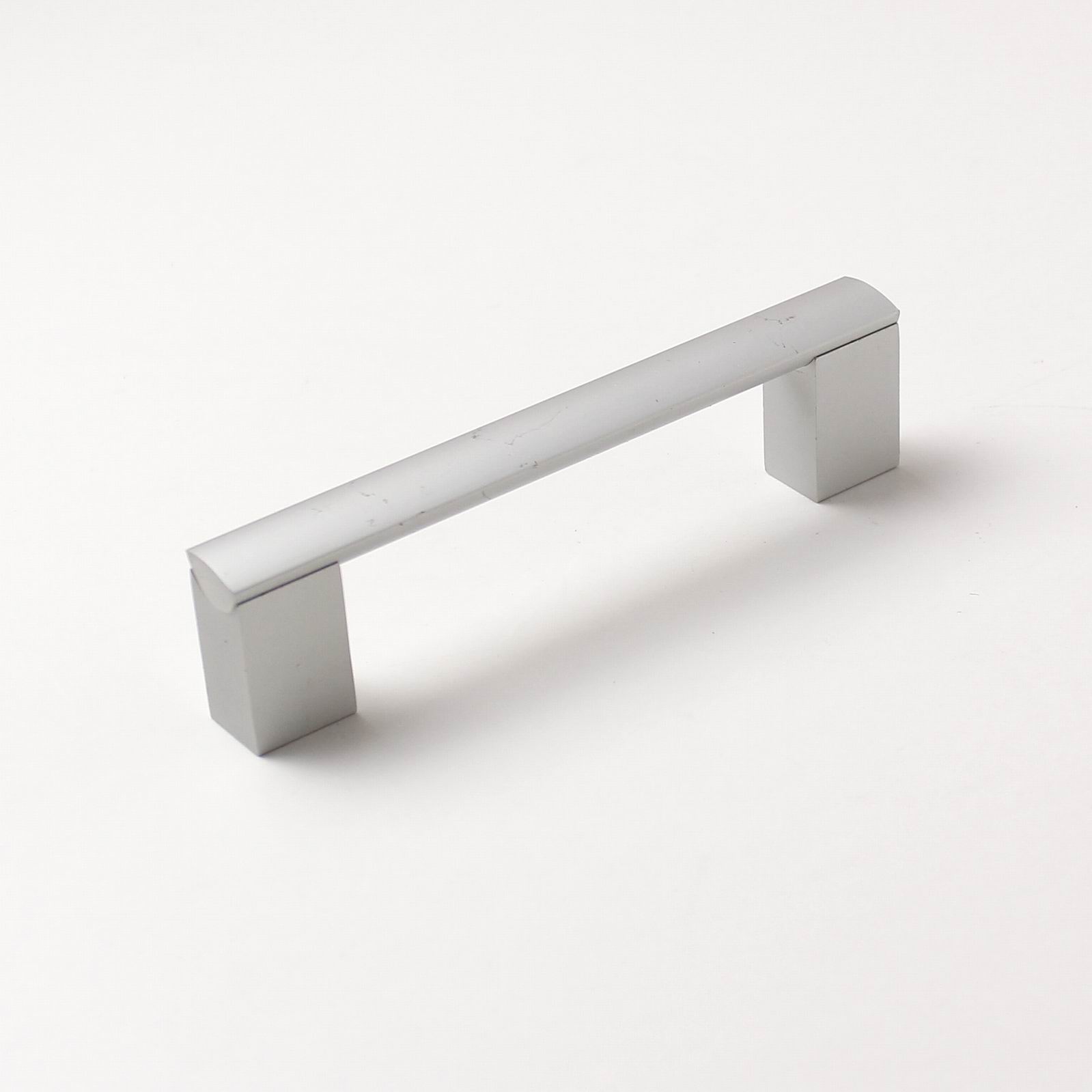 63731 úchytka XAVER rozteč 128mm hliník