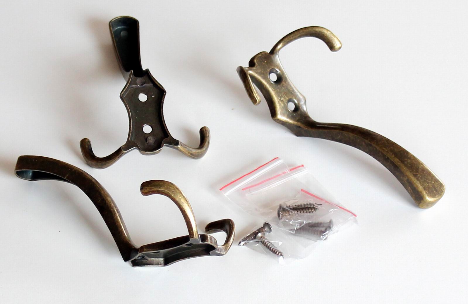 91042 věšák kloboukový stará mosaz