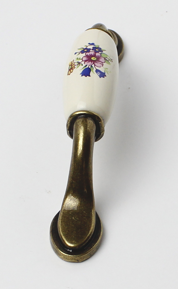 91454- Úchyt 96mm porcelán kytka